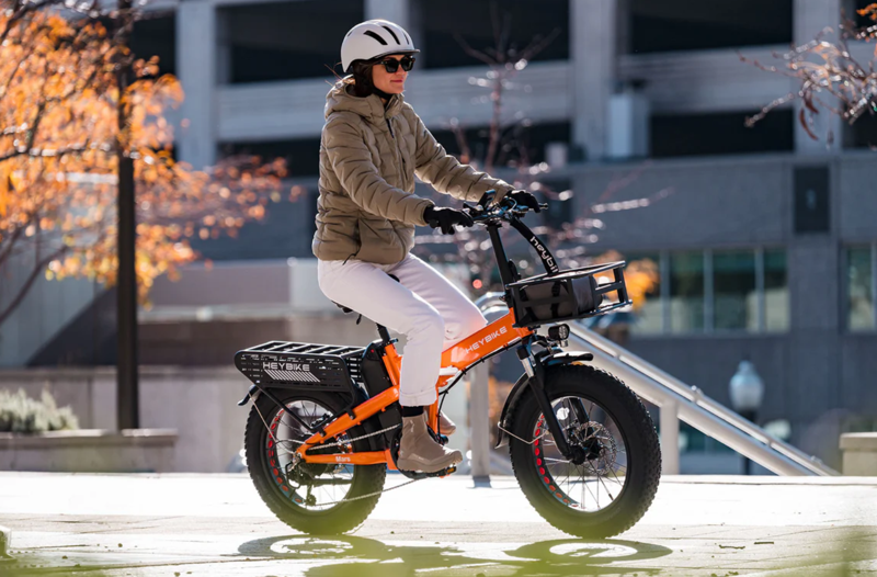 A person riding their Mars 2 Ebike in a city.